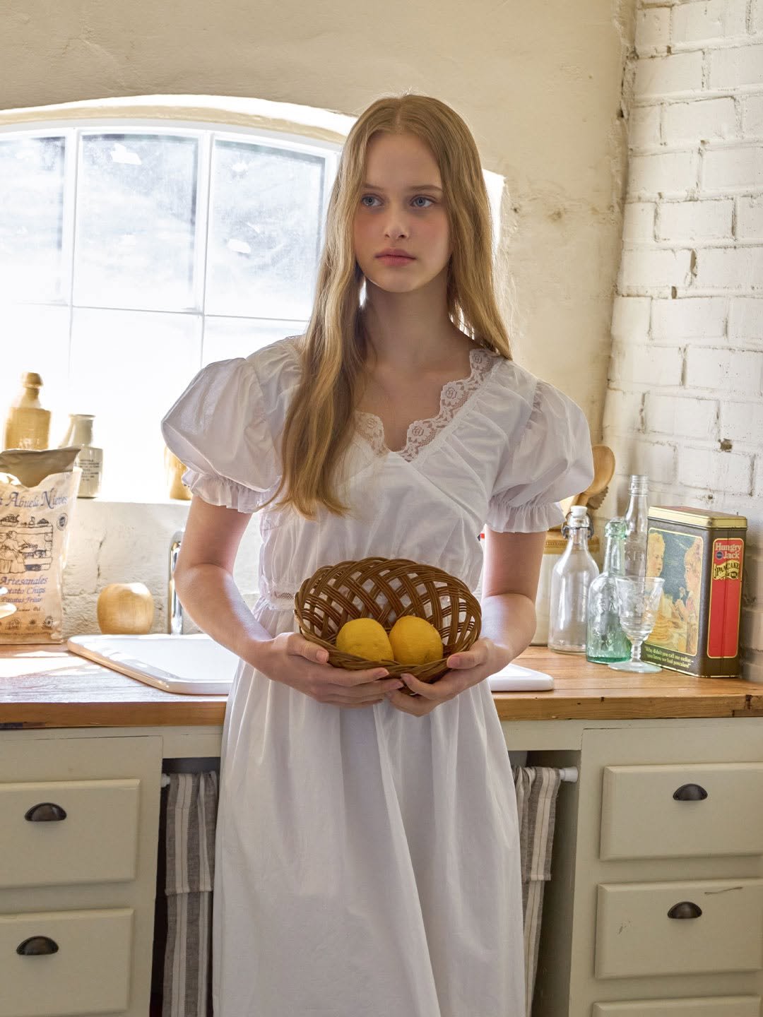 Photo by DUBLEVE 드브르베 on April 12, 2026. May be an image of sundress and text.