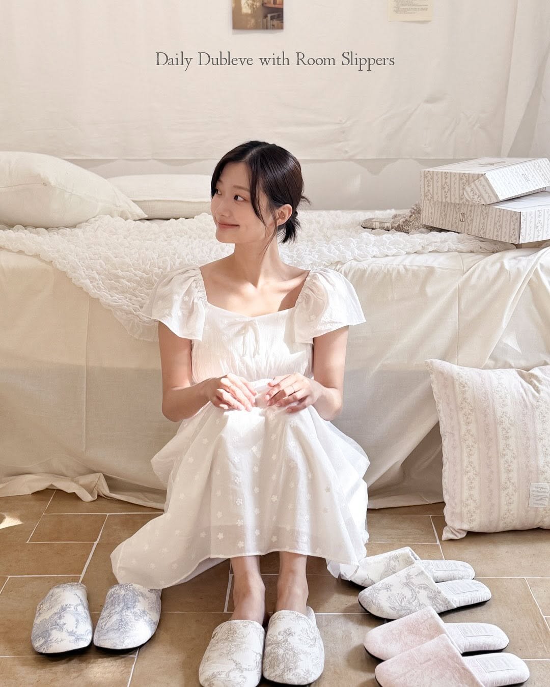 Photo by DUBLEVE 드브르베 on November 02, 2025. May be an image of sleepwear, dress, baby's-breath and text that says 'Daily Dubleve with DailyDublevewithRoomSlippers Room Slippers'.