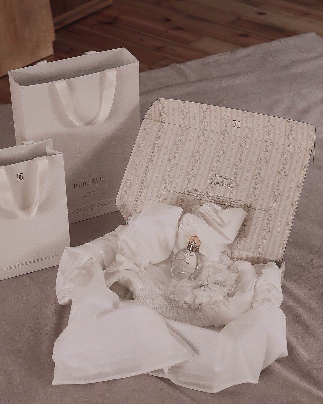 Photo by DUBLEVE 드브르베 on October 27, 2025. May be an image of baby bed and text.