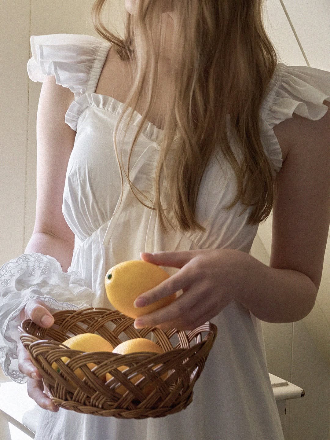Photo by DUBLEVE 드브르베 on April 12, 2026. May be an image of sundress, basket and text.