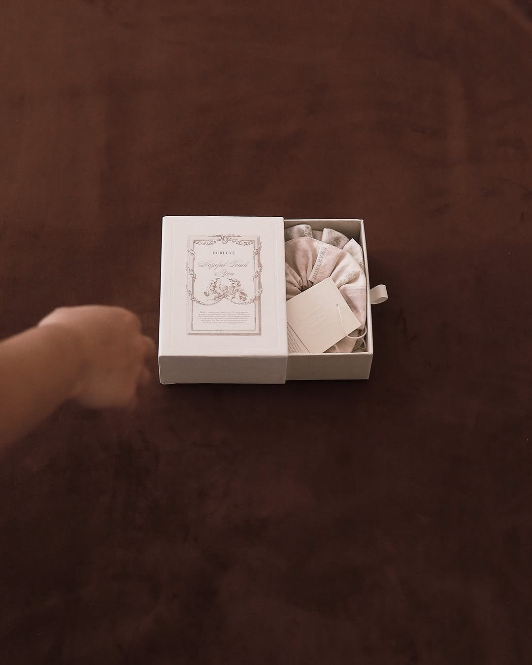 Photo by DUBLEVE 드브르베 on October 27, 2025. May be an image of box, hamper, carton and text.