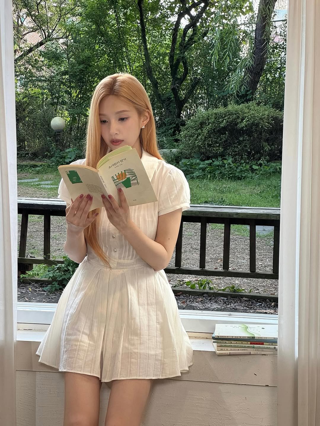 Photo by Joy on October 25, 2025. May be an image of dress, book and text.
