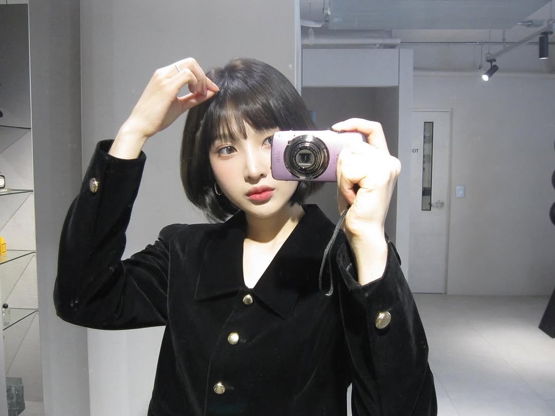 Photo by Joy on October 19, 2025. May be a selfie of one or more people, hair, duffle coat, top, camera, mirror and text.
