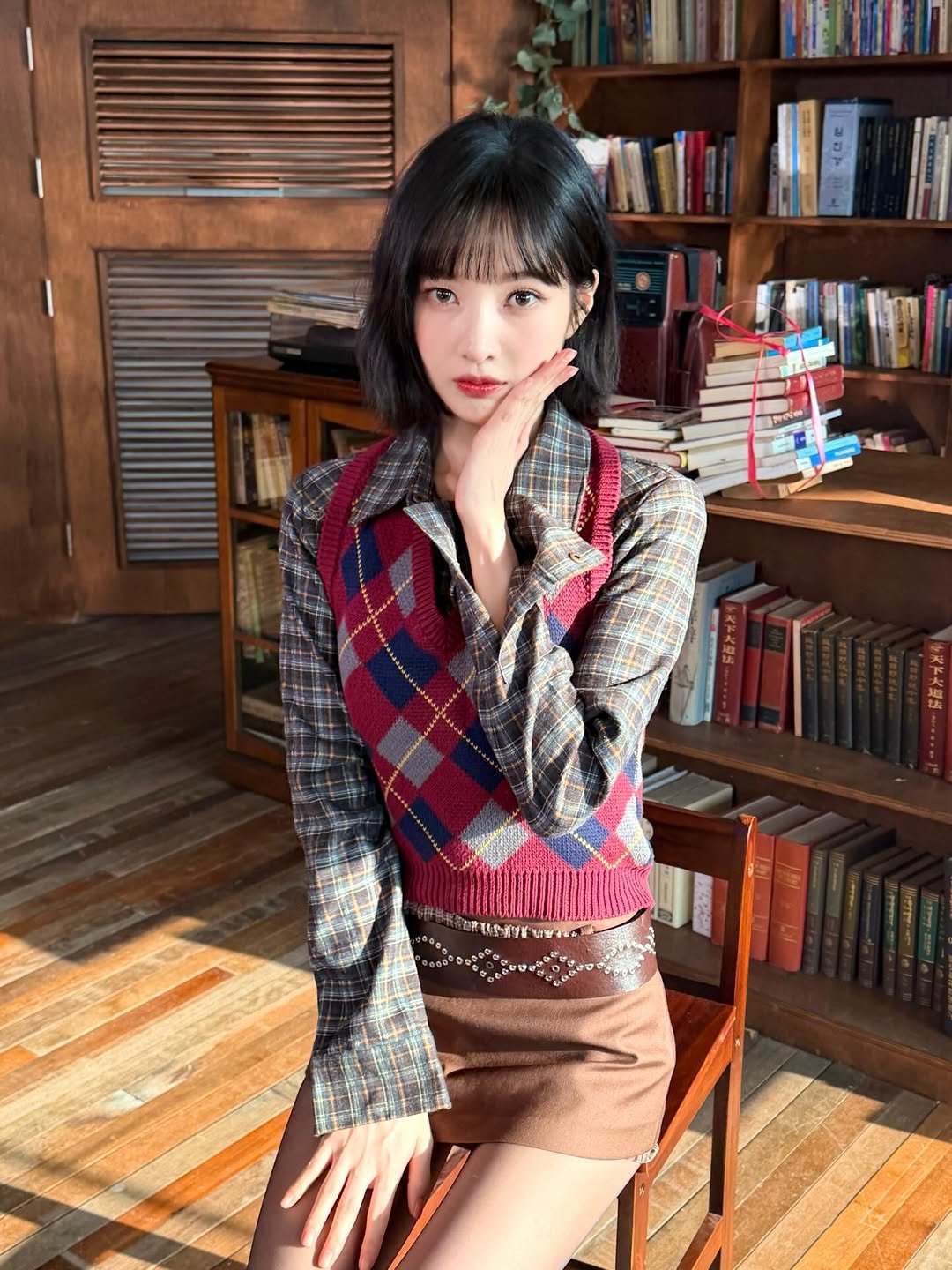 Photo by Joy on December 07, 2025. May be an image of one or more people, hair, turtleneck, miniskirt, vest and text.