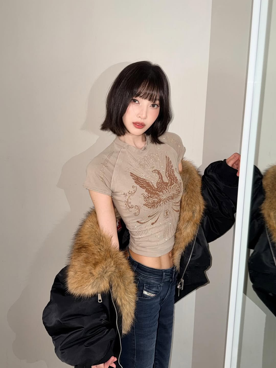 Photo by Joy on November 21, 2025. May be an image of one or more people, bangs, goosedown coat, sable coat, parka, turtleneck, top and text.