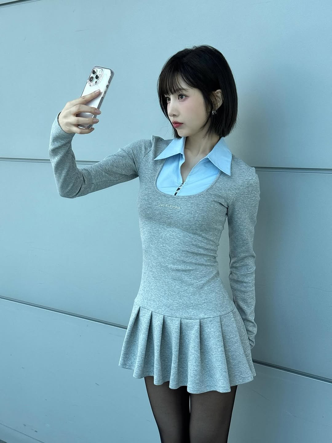 Photo by Joy on October 22, 2025. May be an image of phone, dress, miniskirt and text.