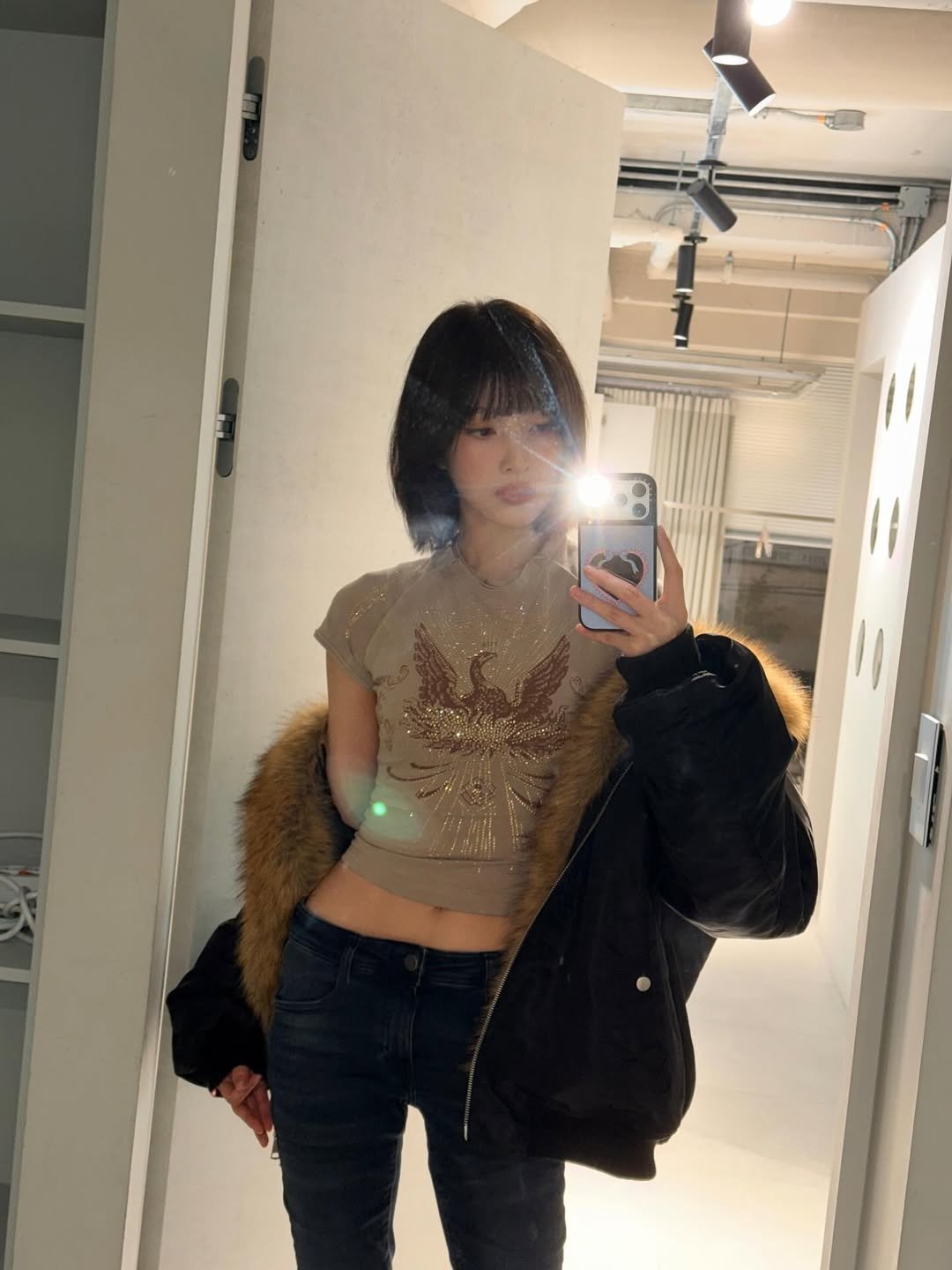 Photo by Joy on November 21, 2025. May be a selfie of one or more people, hair, goosedown coat, parka, mirror and text.