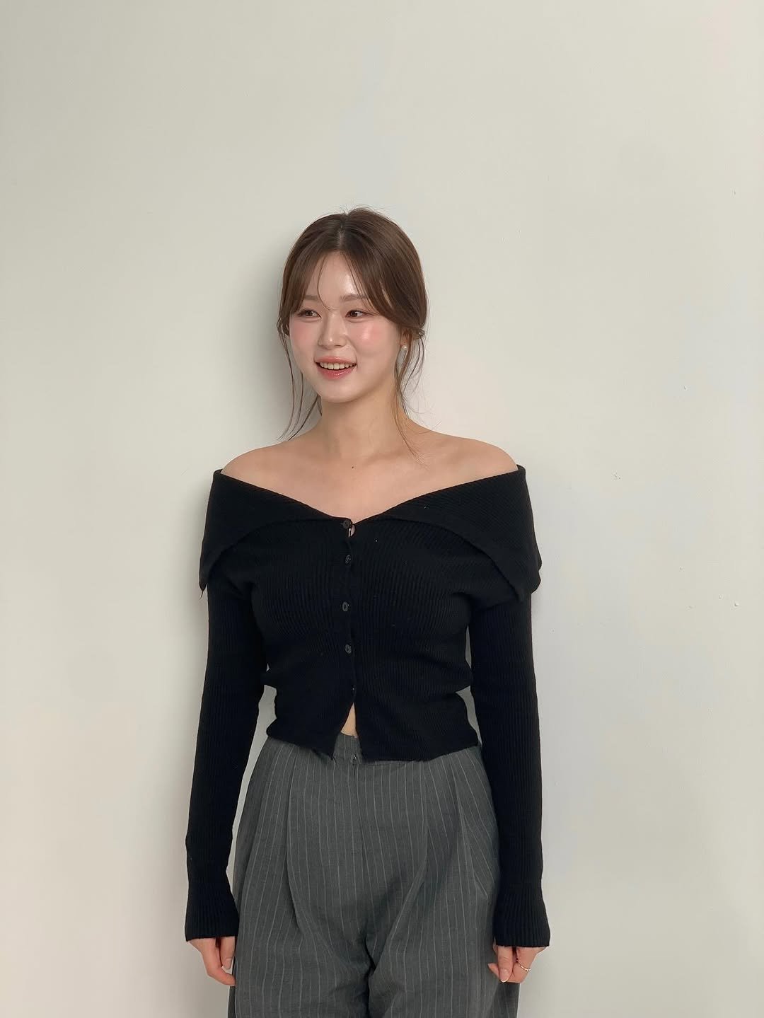 Photo by 정재희 on August 14, 2025. May be an image of 1 person, hair, turtleneck, top and text.