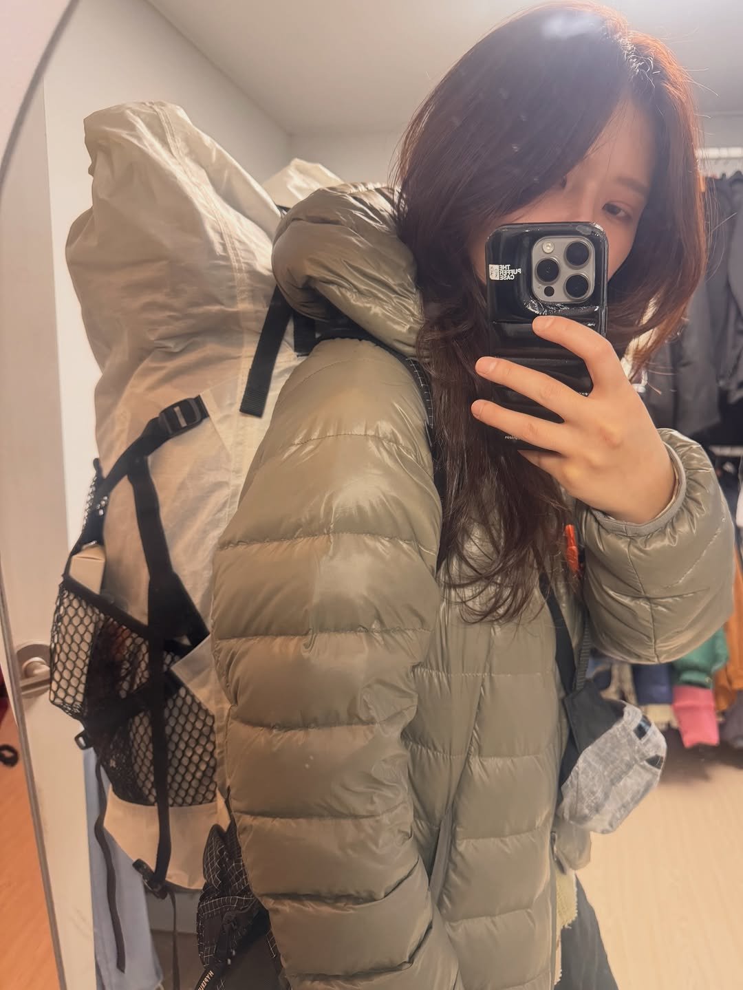 Photo by 🦦 on December 07, 2025. May be an image of duffle coat, goosedown coat, parka, sling, jacket and outdoors.