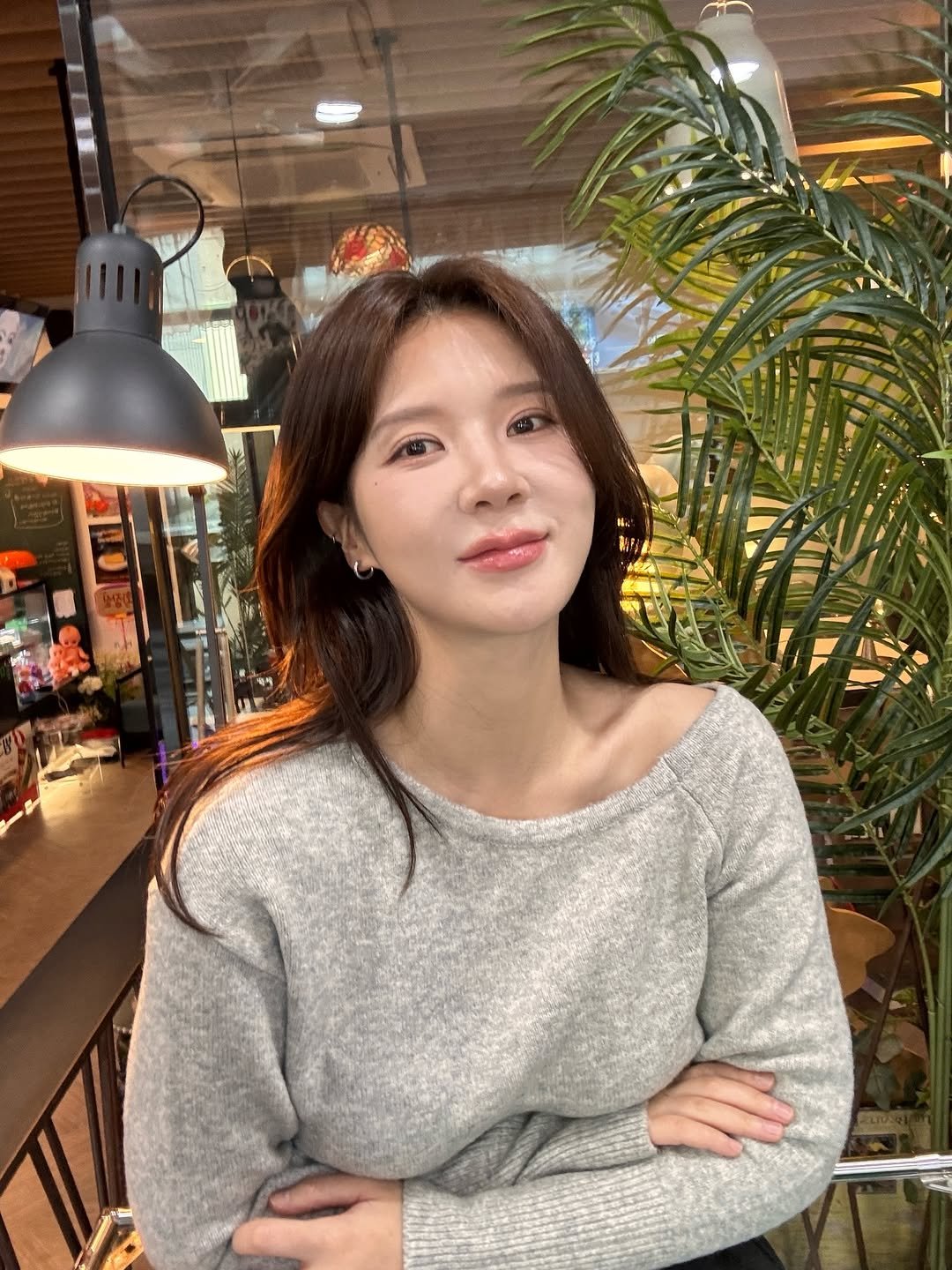 Photo by 🦦 on December 18, 2025. May be an image of one or more people, hair, top, turtleneck and text.