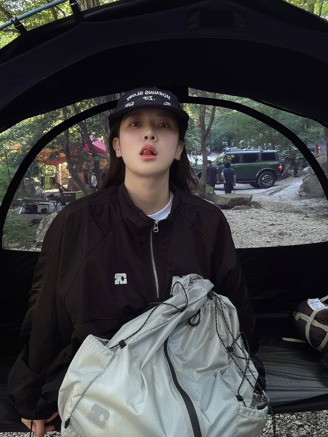 Photo shared by 🦦 on July 31, 2025 tagging @centaur.kr. May be an image of campsite, tool bag, hat, raincoat, parka, outdoors and text.