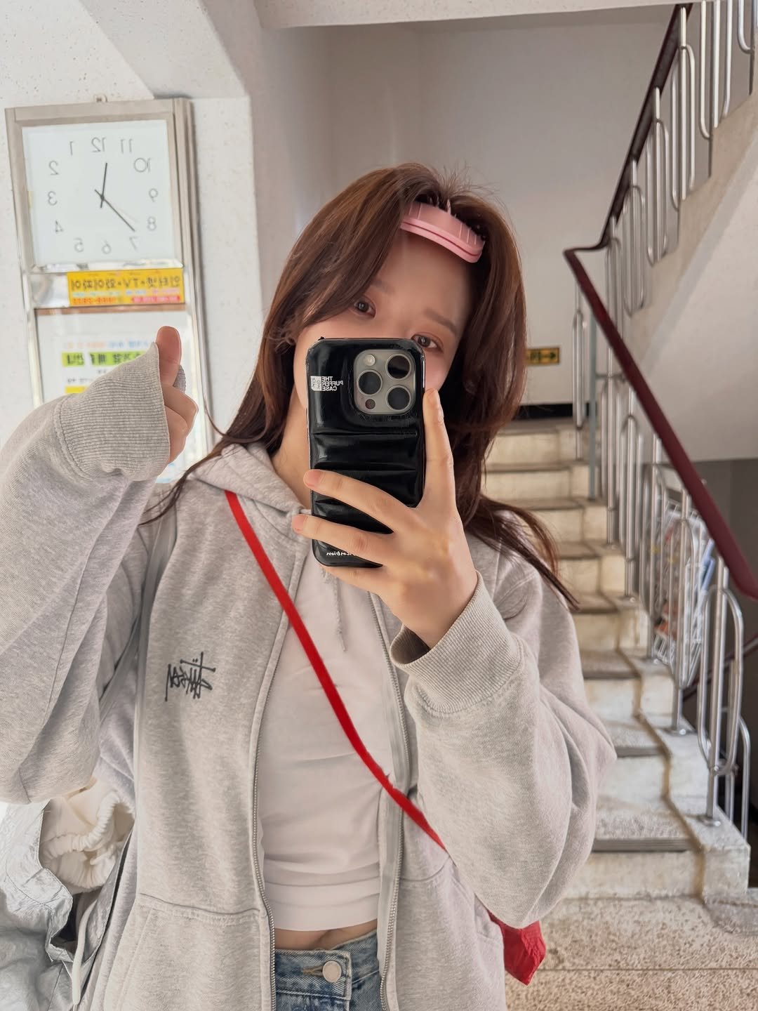 Photo by 🦦 on February 19, 2026. May be a selfie of phone, jacket, sweatshirt, parka, mirror and text.