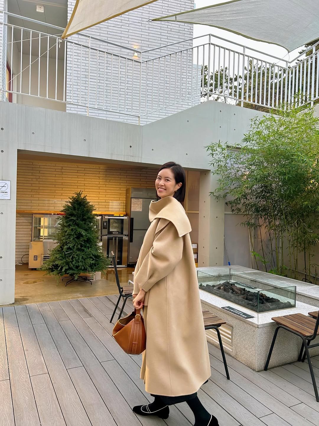 Photo shared by CHOI YEOKYUNG on November 09, 2025 tagging @bowen.official, and @bowen.kr. May be an image of duffle coat, overcoat, sable coat, turtleneck, parka, cornflower and text.