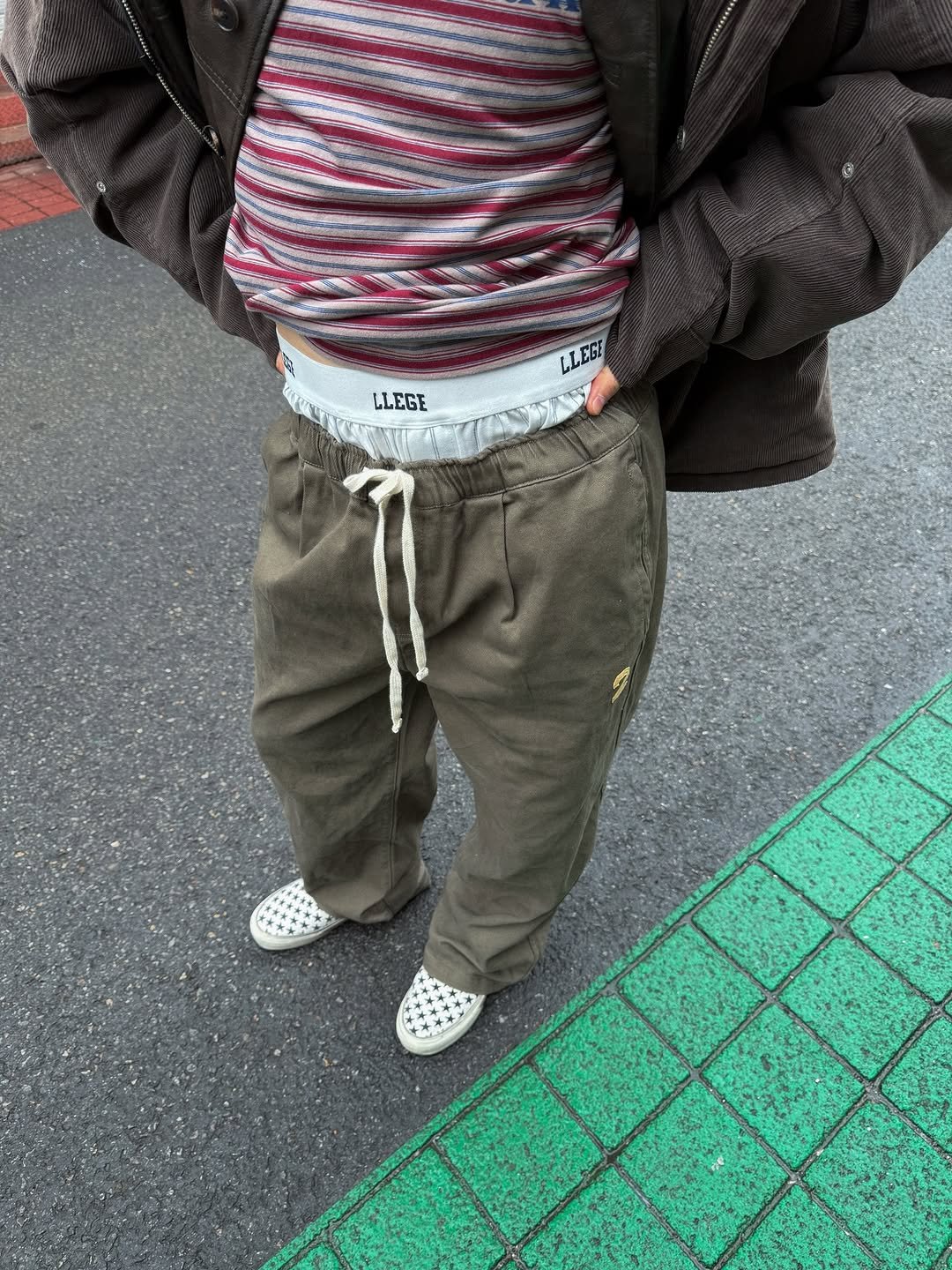 Photo shared by 이준혁 on December 15, 2025 tagging @aeth.site. May be an image of sweatpants, street and text.