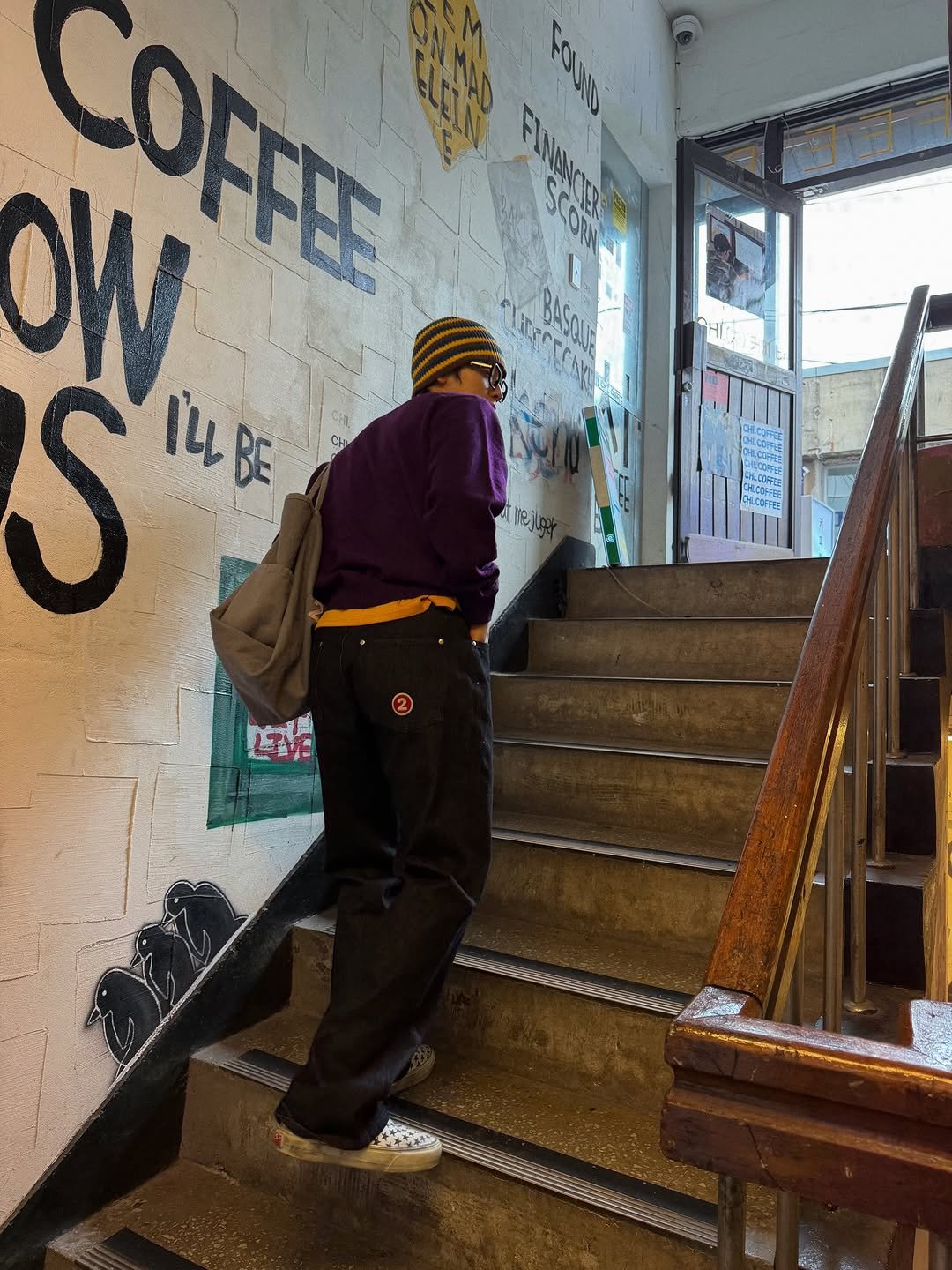 Photo shared by 이준혁 on December 06, 2025 tagging @aeth.site. May be an image of one or more people, people standing, fire escape, street and text.