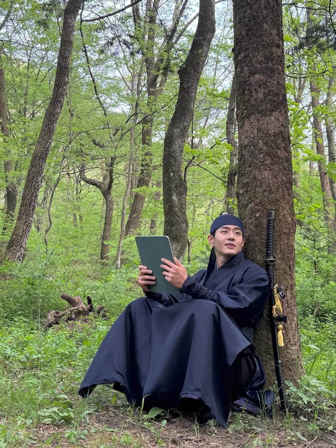 Photo by 이승룡 LEESEUNGRYONG on January 18, 2026. May be an image of cloak and tree.