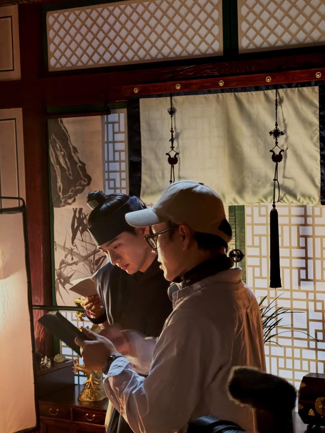 Photo by 이승룡 LEESEUNGRYONG on February 14, 2026. May be an image of one or more people, wind chime, lantern and text.