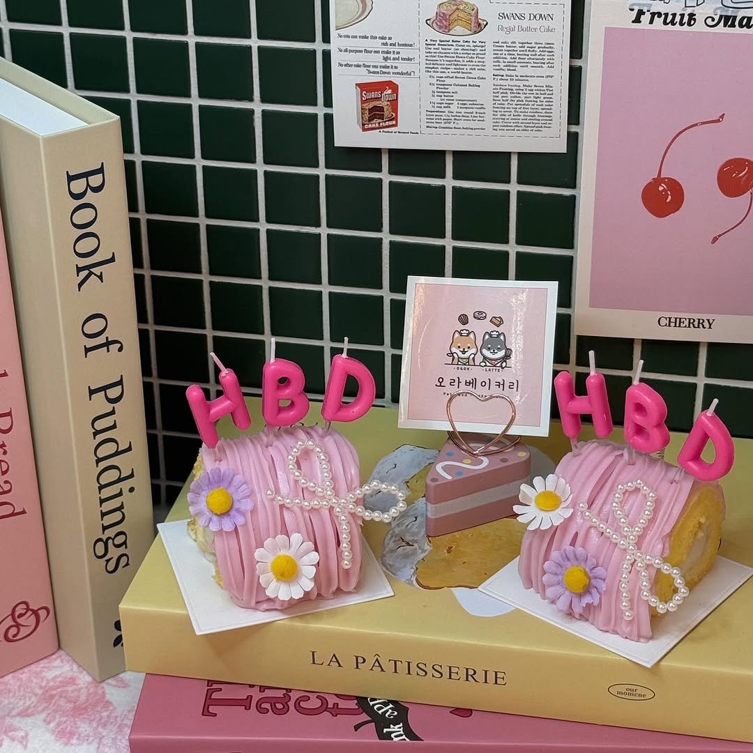 Photo by 오라베이커리 송파 강아지당일케이크 강아지수제간식 in 송리단길 SongniDan-gil. May be an image of book, candle and text.