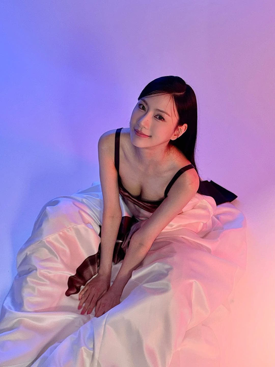 Photo shared by 오하영 Oh Hayoung on October 30, 2025 tagging @official.apink2011. May be an image of one or more people, hair, slip, costume, bra, dress and text.