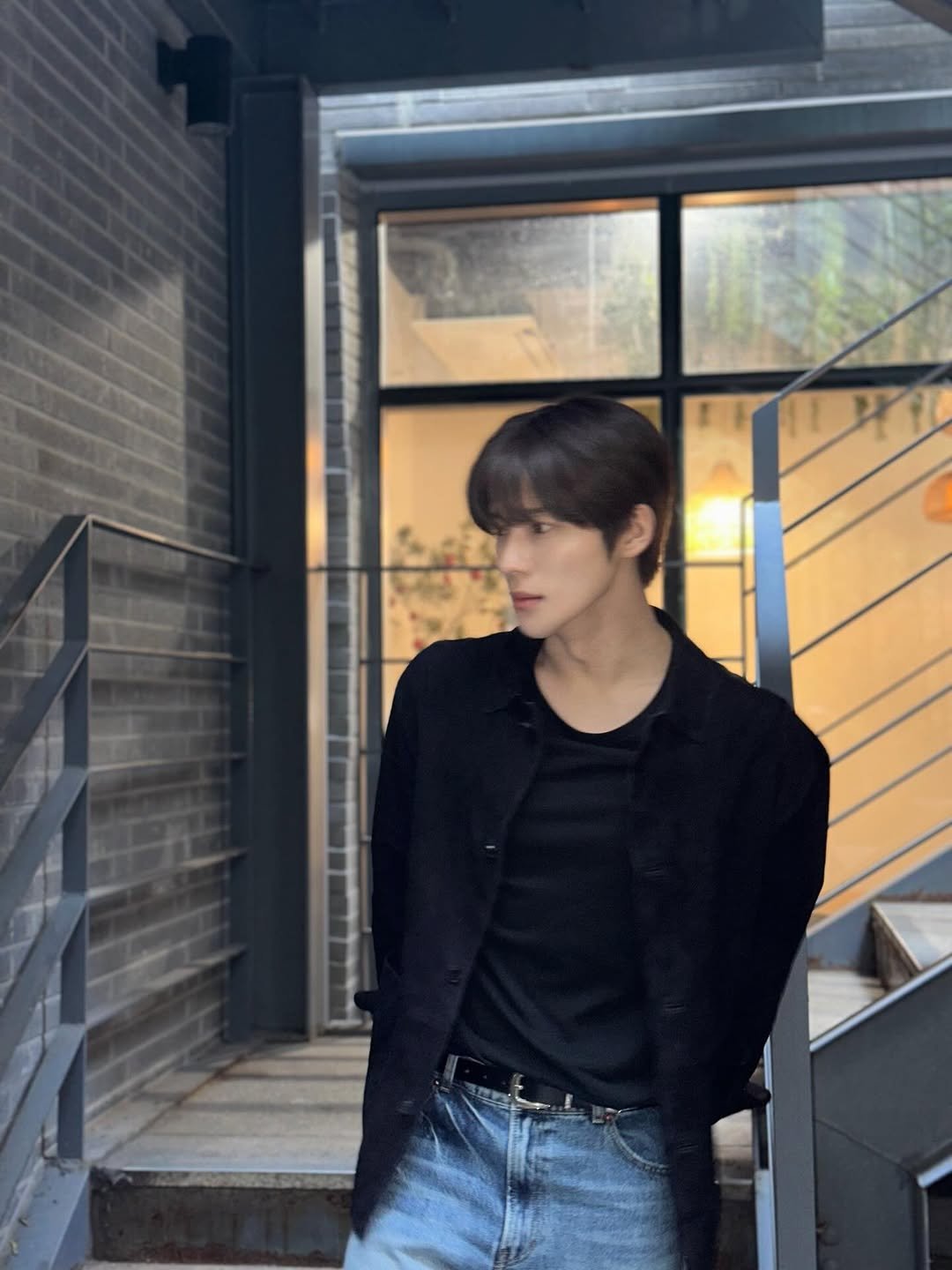 Photo by 문상민 on February 20, 2026. May be an image of duffle coat, bolo tie, top and text.