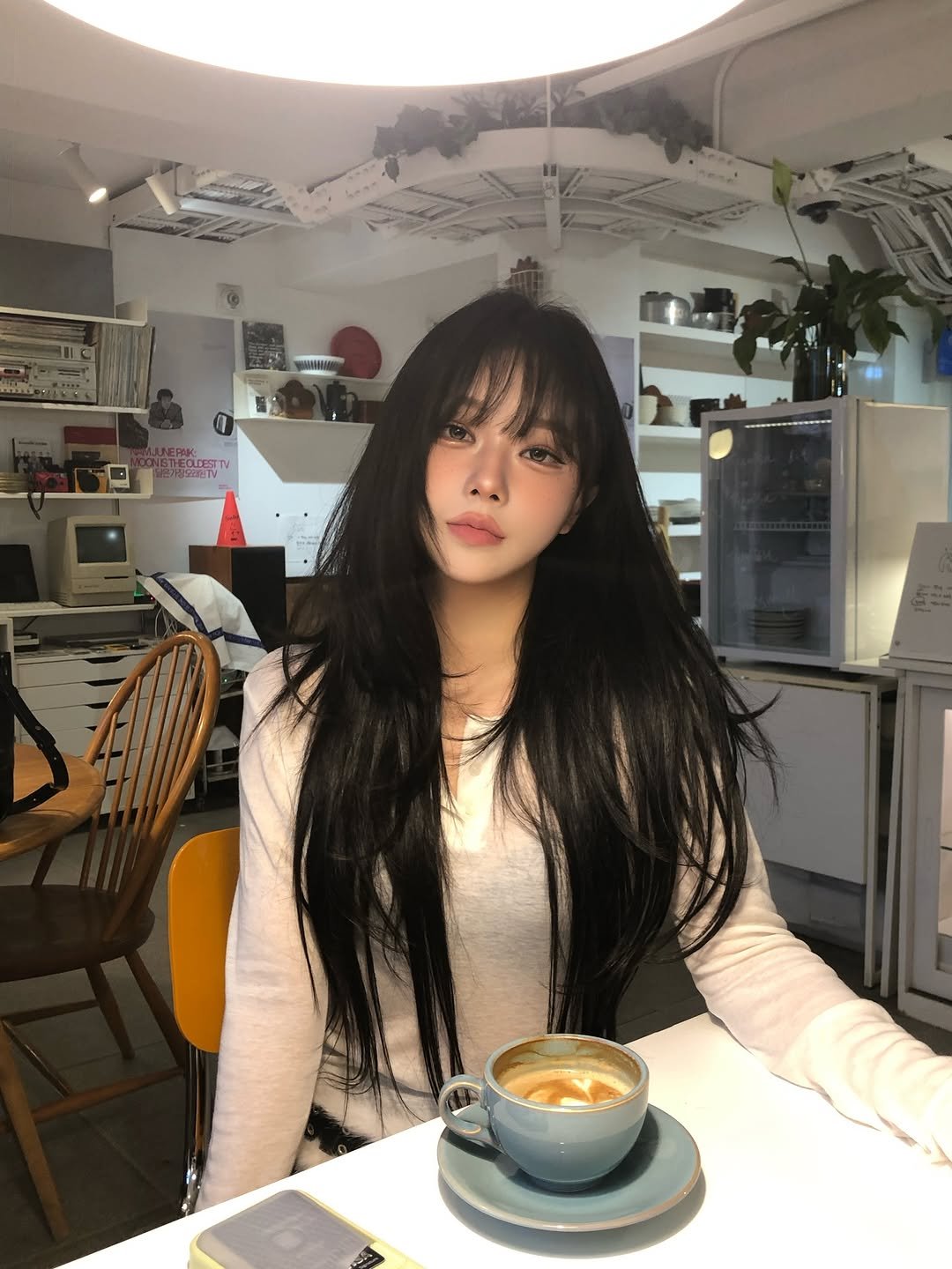 Photo shared by 임서현 on November 30, 2025 tagging @myfipn. May be an image of one or more people, hair, coffee cup, coffee, cappuccino, cornflower and text.