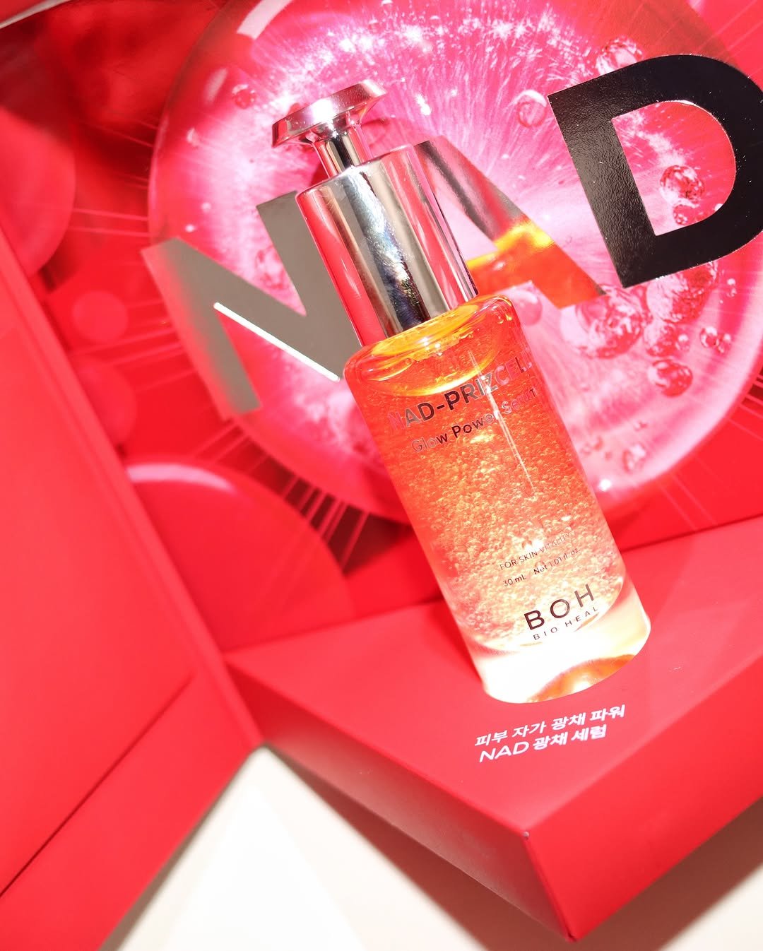 Photo shared by 쎄써미솔트 on September 28, 2025 tagging @bioheal.boh_official. May be an image of one or more people, makeup, fragrance, hand cream, cosmetics, perfume and text that says 'AD-PRIZ AD-PRI 三二 SOR ፍረማዊ 30ml BOH H He EA 피부 .광채세럼 교피부자가광채파워 피부자가 자가 광채 광채 파워 NAD 광채세럼 세럼'.