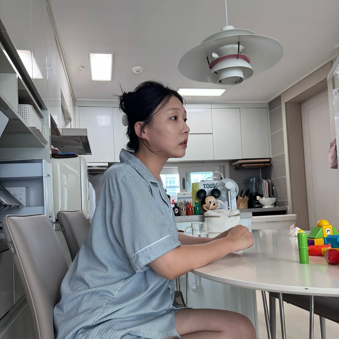 Photo shared by 소떡부부 on September 27, 2025 tagging @ssotteok_papa. May be an image of 1 person, sleepwear, clothes iron, cornflower and text.