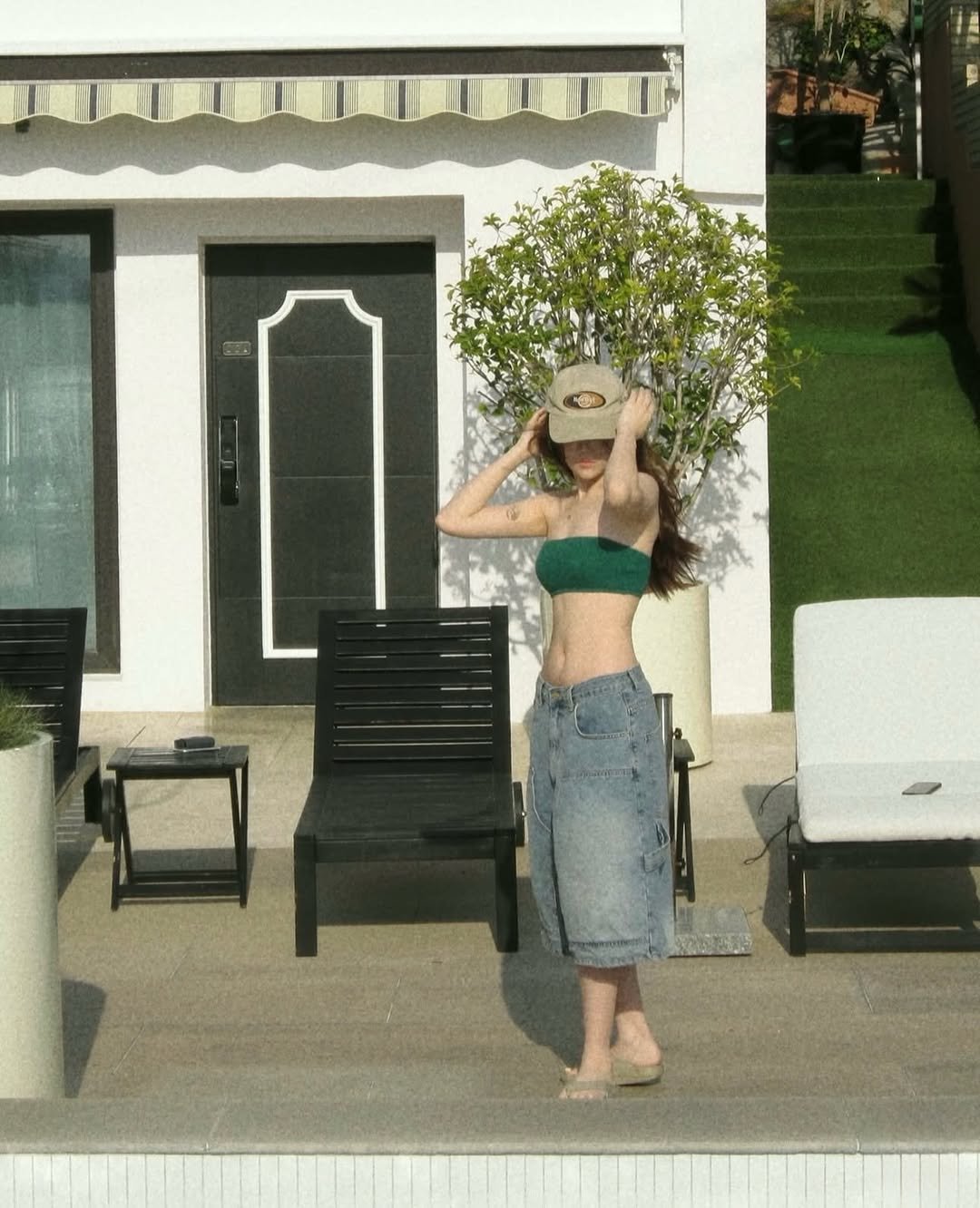 Photo by 여수펜션 | 솔스테이 풀빌라 solstay poolvilla on May 01, 2025. May be an image of 1 person, hat, pool, outdoors and text.