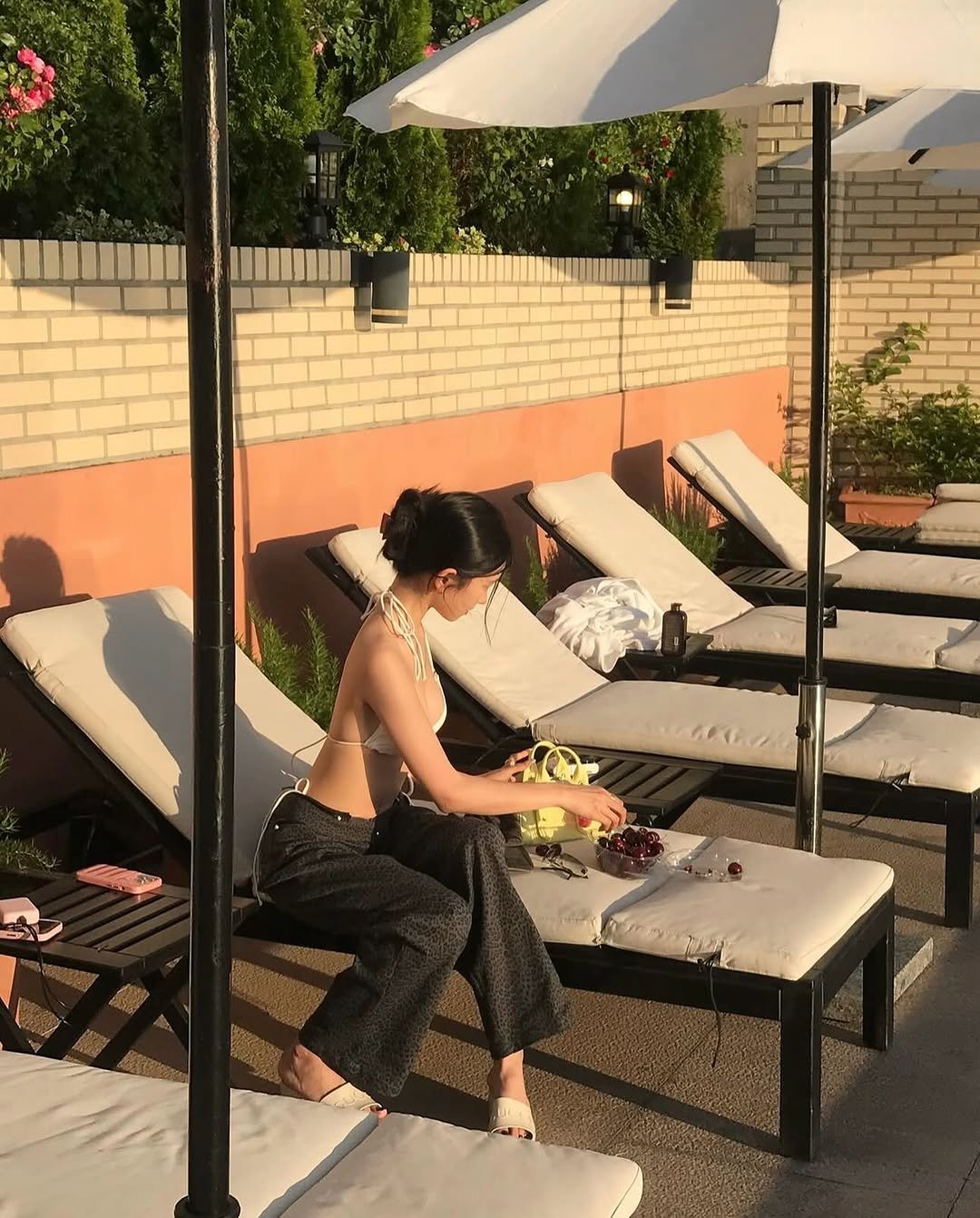 Photo by 여수펜션 | 여수풀빌라 | 여수숙소 | 솔스테이 solstay poolvilla on September 18, 2025. May be an image of 1 person, deck chair, parasol, chaise lounge, pool and text.