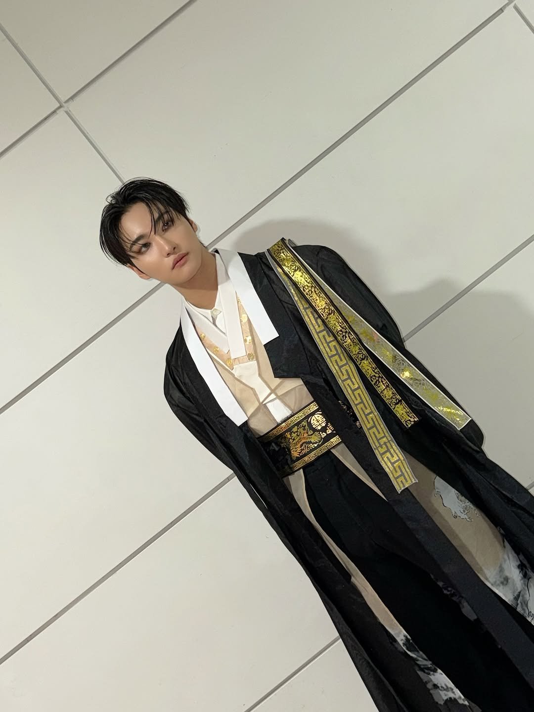 Photo by SEONGHWA on December 31, 2025. May be an image of belt, bolo tie, costume and text.