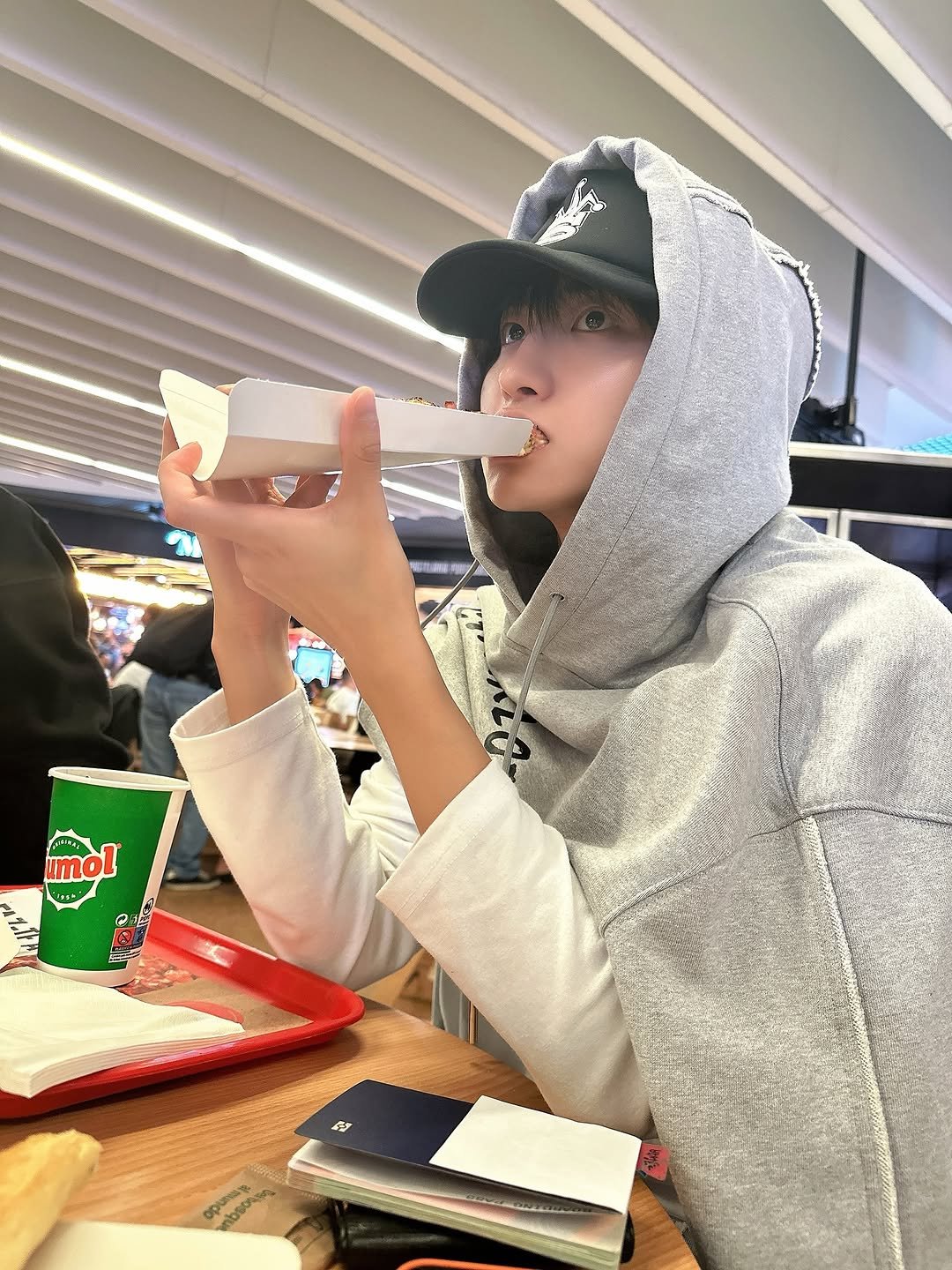 Photo by SEONGHWA on October 05, 2025. May be an image of 1 person, hat, cigarette, parka and text.