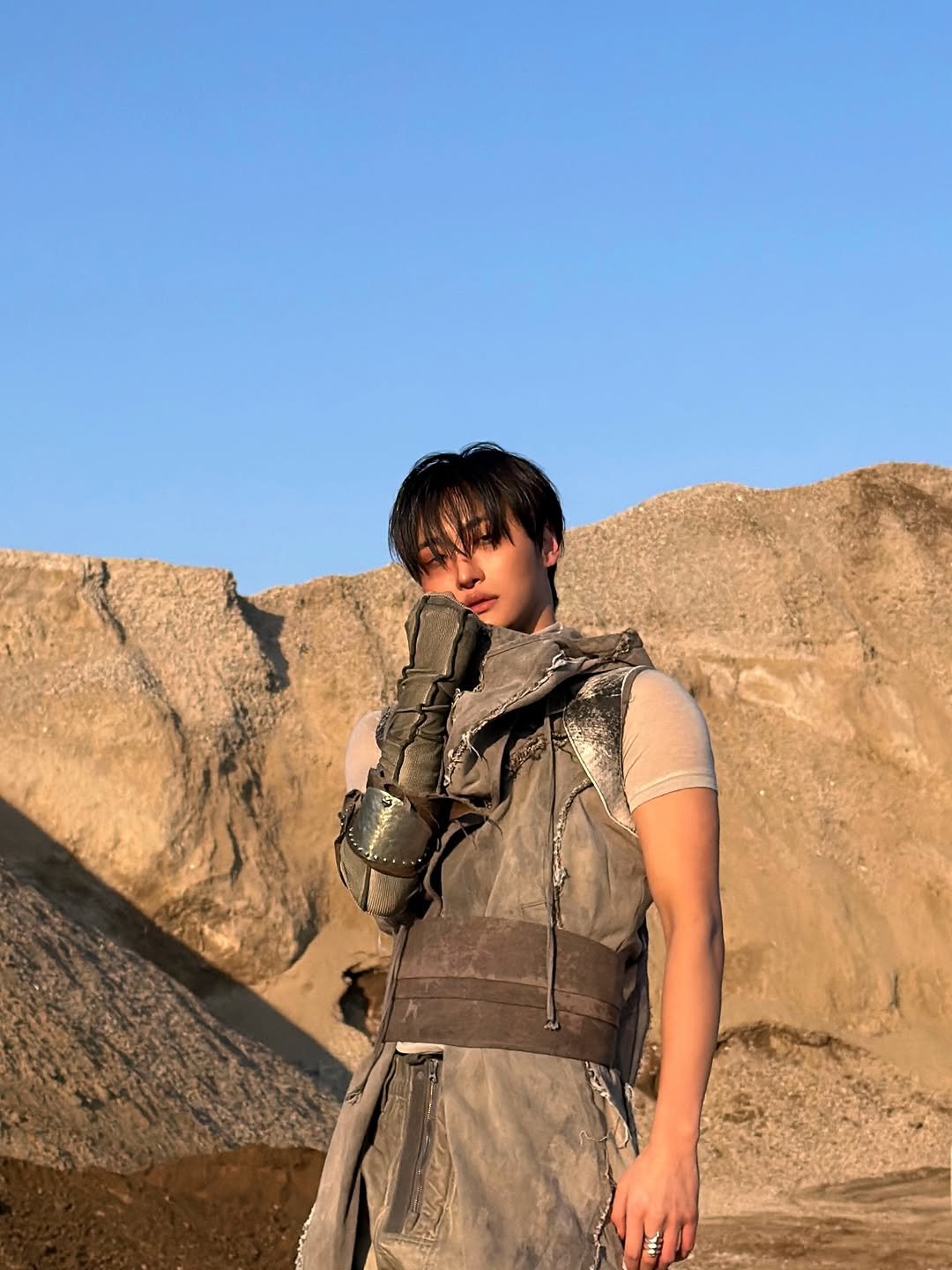 Photo by SEONGHWA on February 27, 2026. May be an image of one or more people, makeup, vest, gas mask, glasses and text.