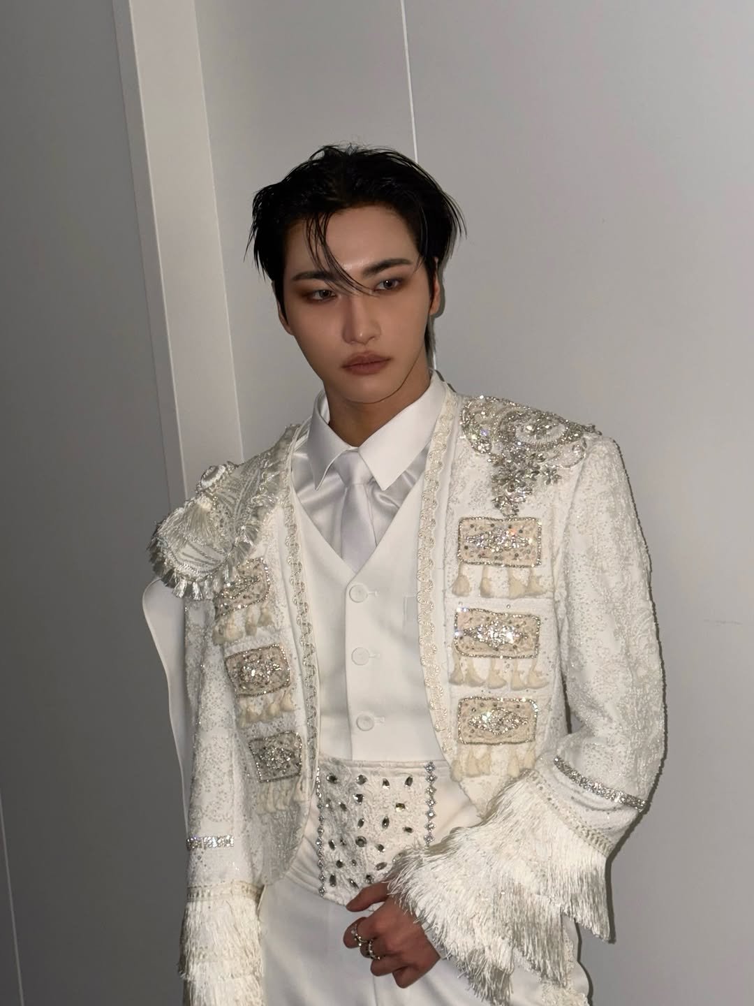 Photo by SEONGHWA on December 17, 2025. May be an image of suit, blazer, dinner jacket, bolo tie and text.