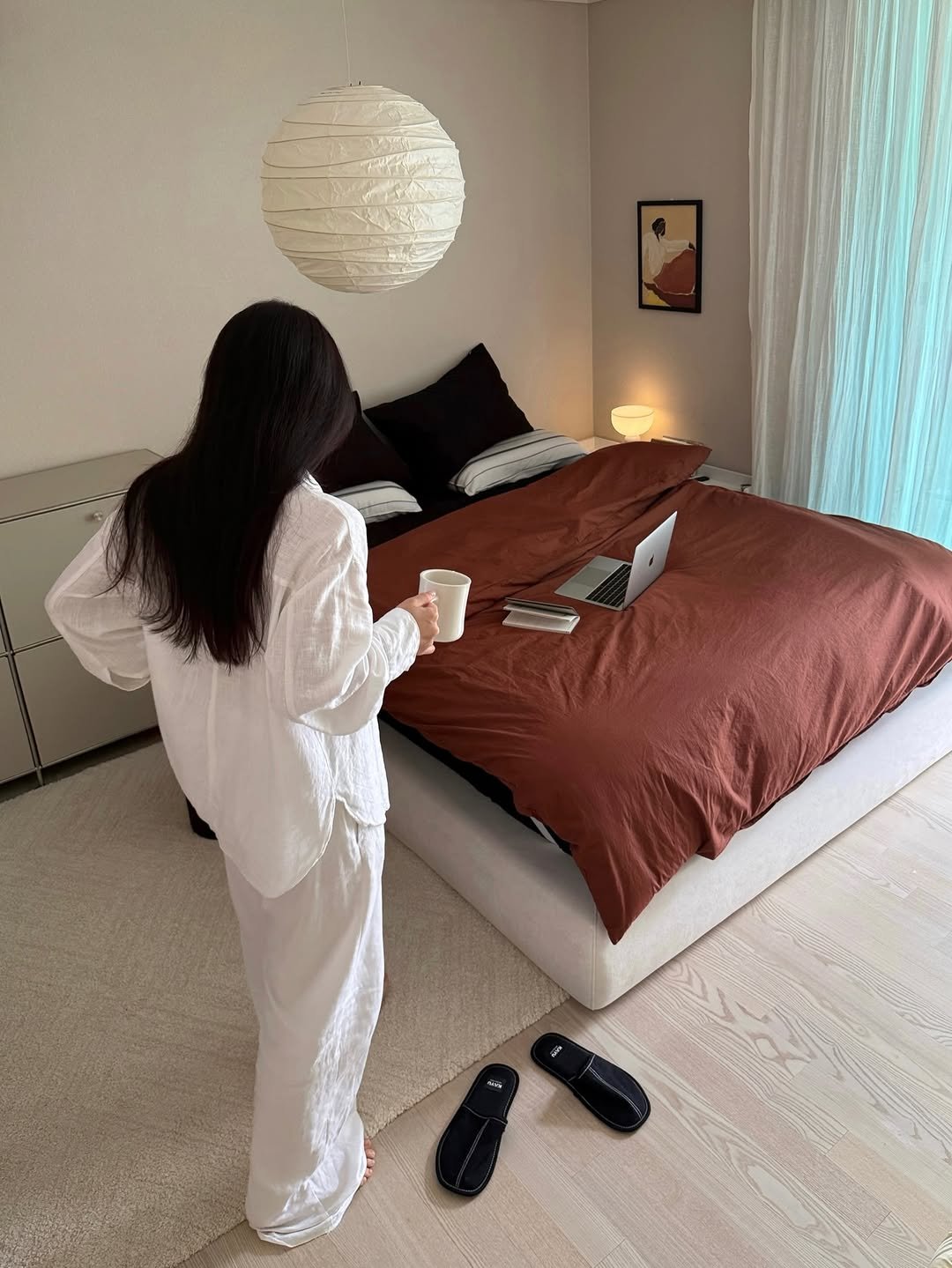 Photo by nini♡ on April 12, 2026. May be an image of sleepwear, bed, robe, bath robe, mattress, bedroom, indoors and text.