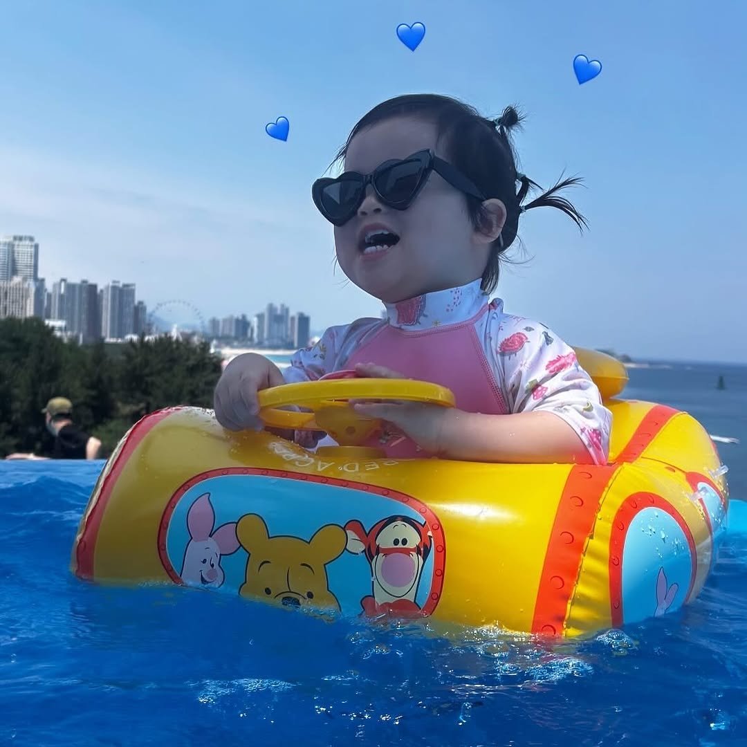 Photo by ʚ♡ɞ 채아네 ʚ♡ɞ on July 08, 2025. May be an image of 2 people, baby, raft, glasses, pool and text.