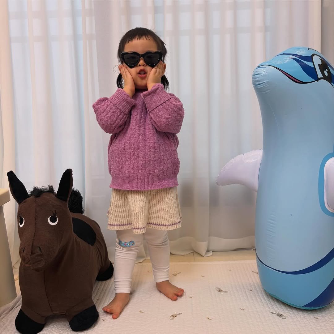 Photo by 채아 성장일기🫧🩵 on February 12, 2026. May be an image of baby, seahorse, pony, dolphin, seal, beanbag chair, glasses, eye patch and text.