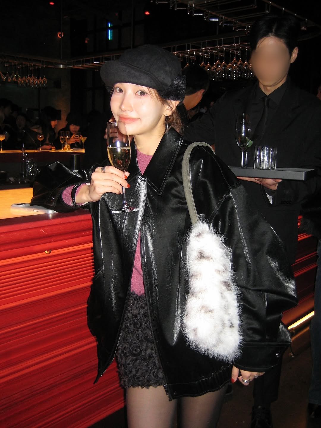 Photo shared by 유니 on November 12, 2025 tagging @miumiu. May be an image of sable coat, goosedown coat, parka, beret and text.