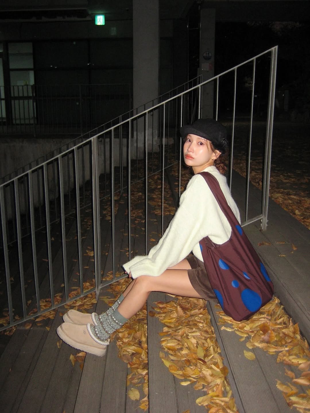 Photo shared by 유니 on November 17, 2025 tagging @bananasisters.official. May be an image of duffle coat, overcoat, turtleneck, beret, parka and text.