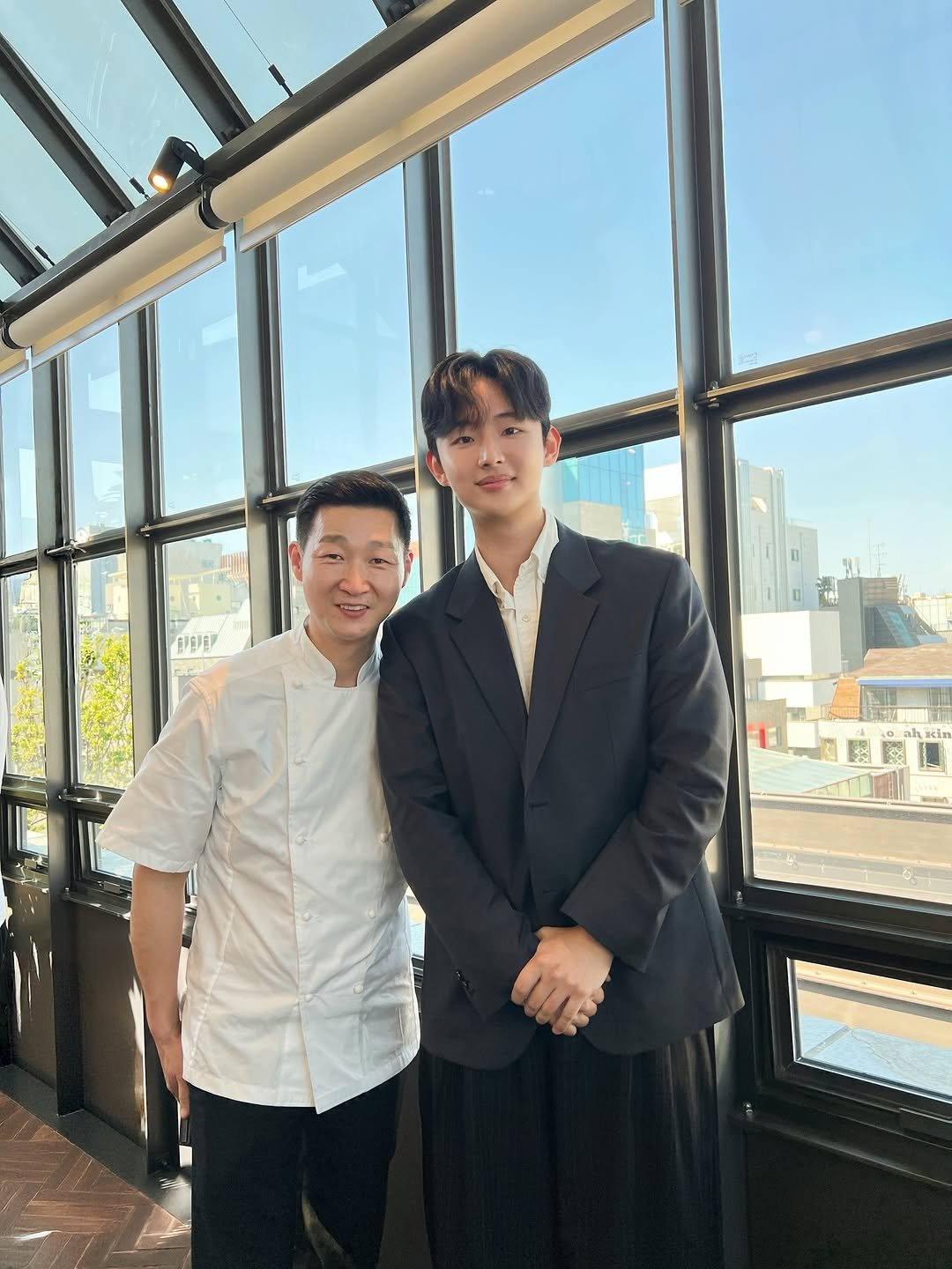 Photo shared by 한신희 on April 08, 2026 tagging @sung.shim. May be an image of one or more people, suit, dinner jacket and text.