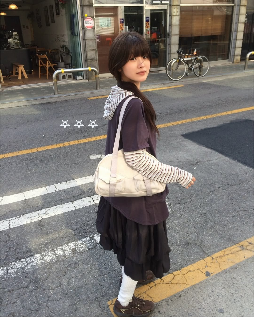 Photo by 예잇 on April 15, 2026. May be an image of miniskirt, sling and text.