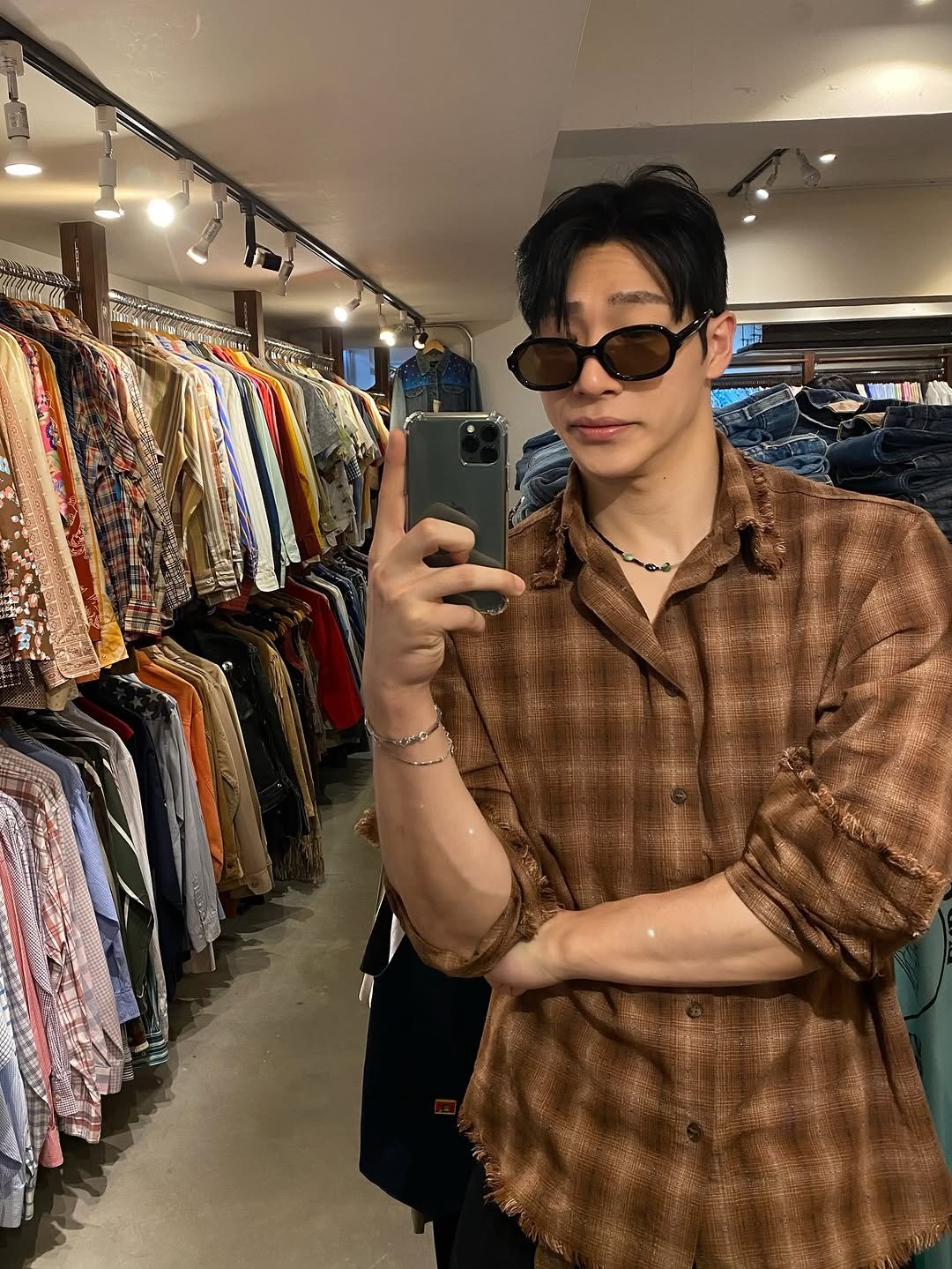 Photo by 임성연 on June 06, 2025. May be a selfie of eyeglasses, flannel, bolo tie and text.