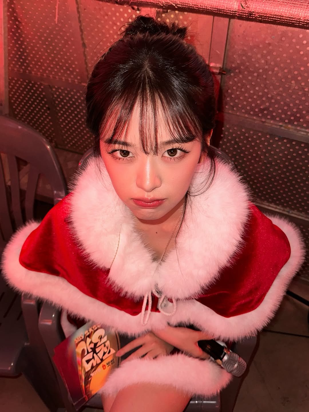 Photo by 안유진 AN YUJIN on December 27, 2025. May be an image of one or more people, hair, makeup, costume and text.