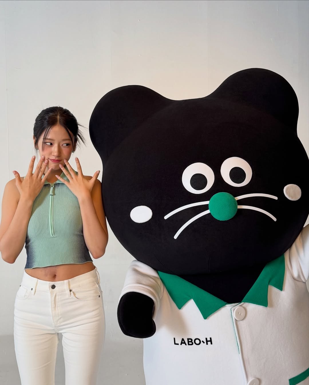 Photo shared by 안유진 AN YUJIN on October 01, 2025 tagging @labo.h_official. May be an image of 1 person, bear, top and text that says 'LABOH'.