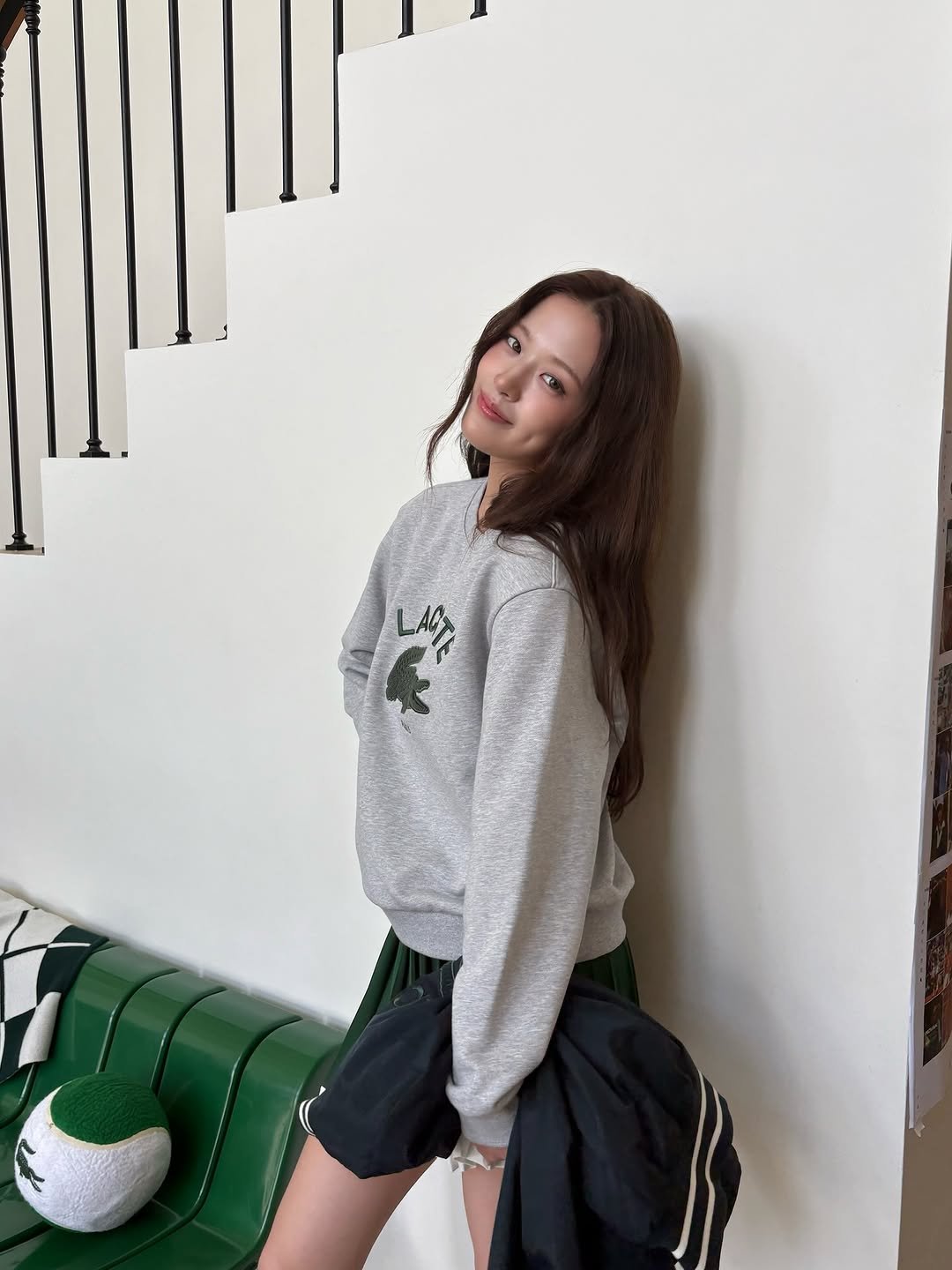 Photo by 안유진 AN YUJIN on October 05, 2025. May be an image of 1 person, hair, shorts, sweatpants, top, miniskirt, sweatshirt and text.