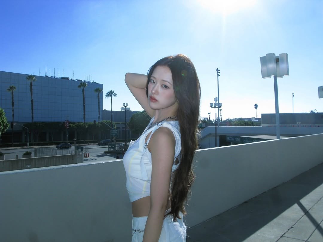 Photo by 안유진 AN YUJIN on August 05, 2025. May be an image of 1 person, long hair and text.