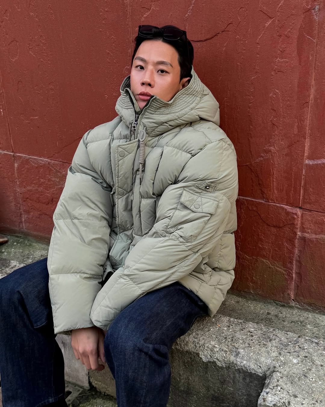 Photo shared by LEEJIKWON on November 09, 2025 tagging @byseries_official. May be an image of duffle coat, overcoat, goosedown coat, jacket, parka, fleece and text.