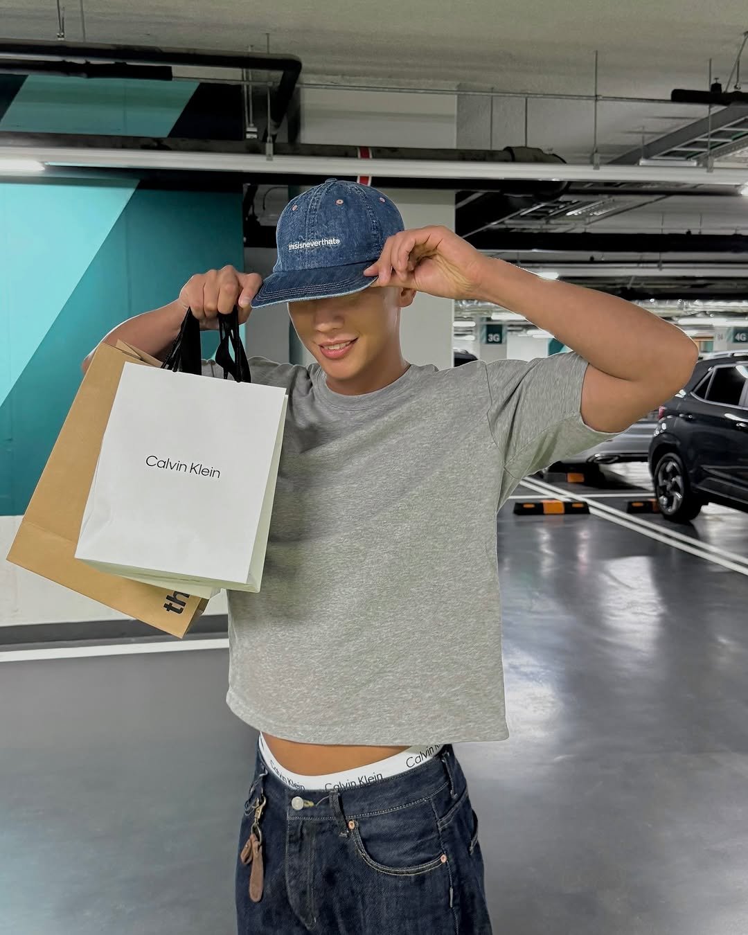 Photo shared by LEEJIKWON on August 25, 2025 tagging @thisisneverthat. May be an image of 1 person, hat and text.