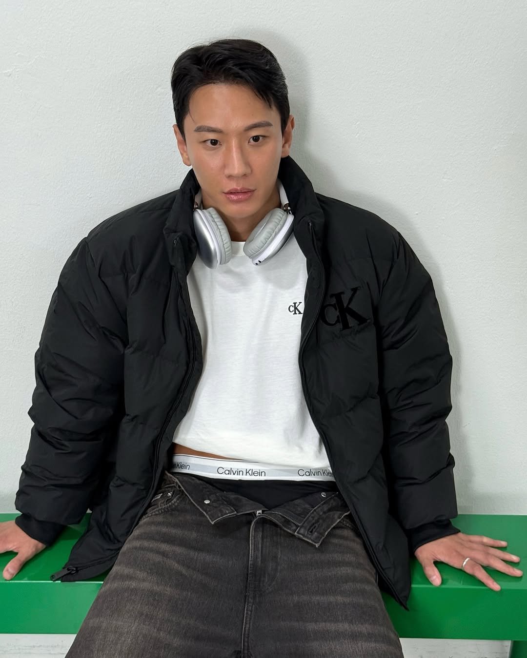 Photo shared by LEEJIKWON on September 30, 2025 tagging @calvinklein. May be an image of 1 person, bangs, duffle coat, goosedown coat, parka, jacket, sportswear and text that says 'CalvinKlein Klein Calvin Calvinke'.