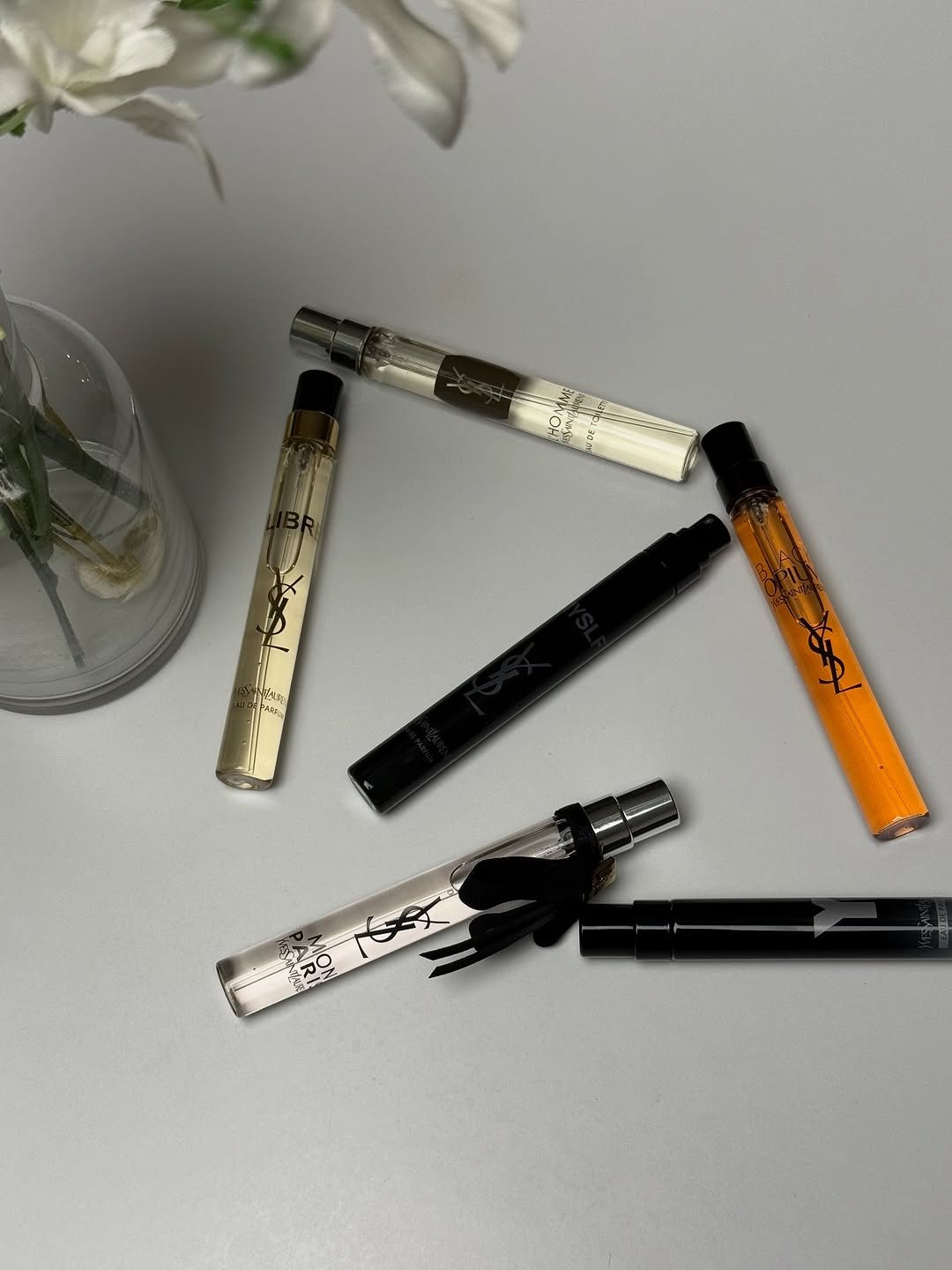 Photo shared by 이지권 JIKWON on November 07, 2025 tagging @yslbeauty. May be an image of measuring stick, marker, pen, pencil case, pencil, cosmetics, ruler, eraser, sharpener and text.