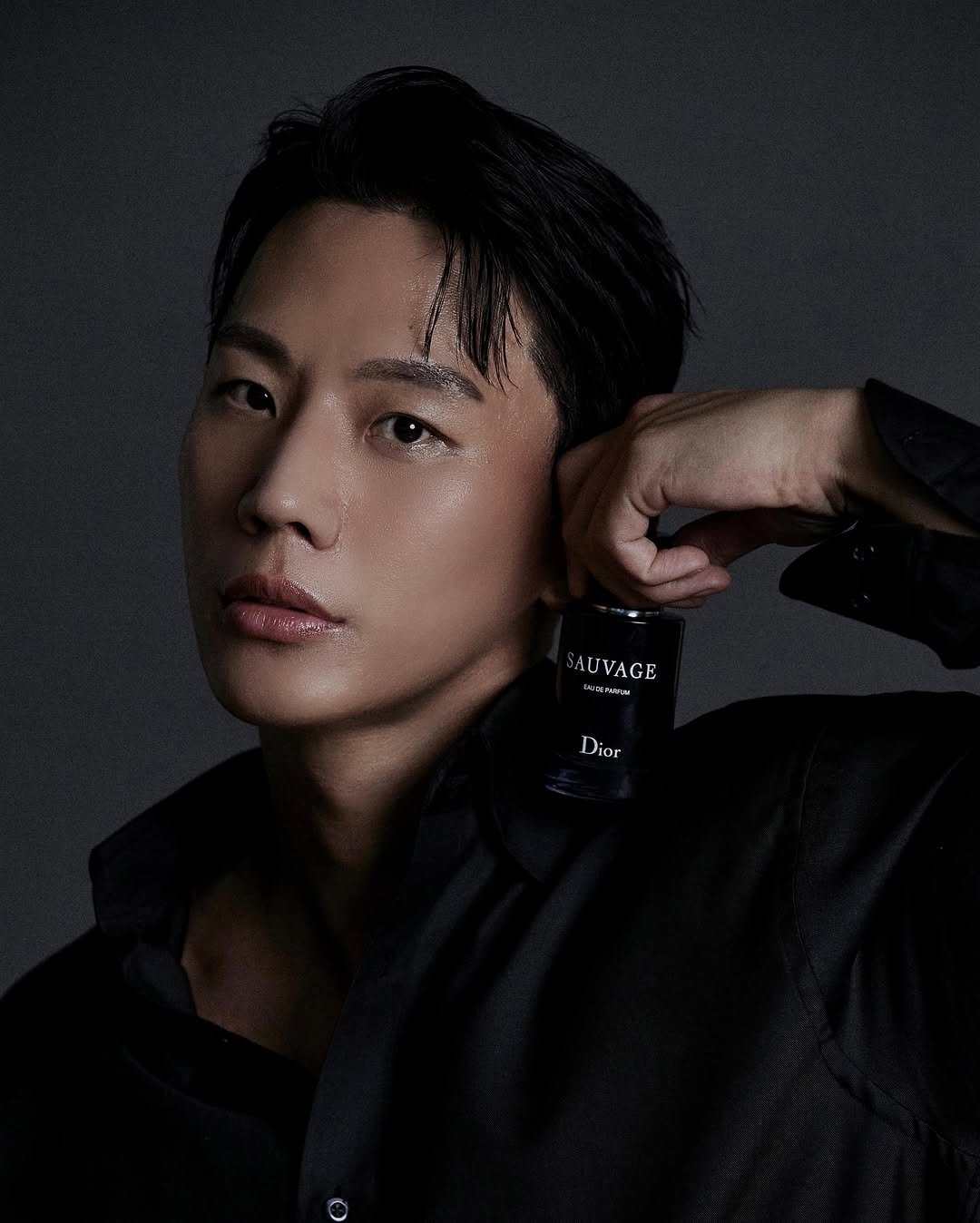 Photo shared by LEEJIKWON on August 22, 2025 tagging @diorbeauty. May be an image of 1 person, makeup, hair, bolo tie and text.